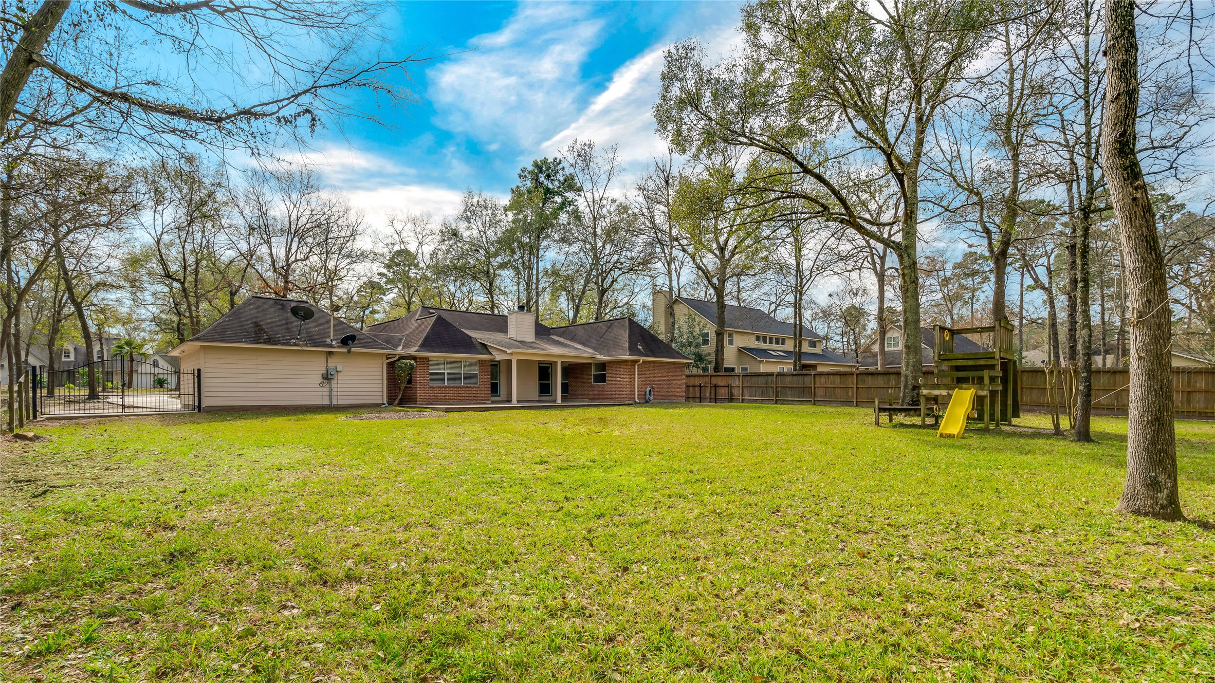 2460 Pebblebrook Circle Conroe, TX 77384 - Photo 24 of 27 *Since the photos were taken, an 8-foot privacy fence was built along the east side property line in the backyard.