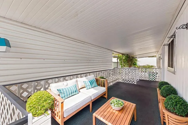 a outdoor living room with furniture