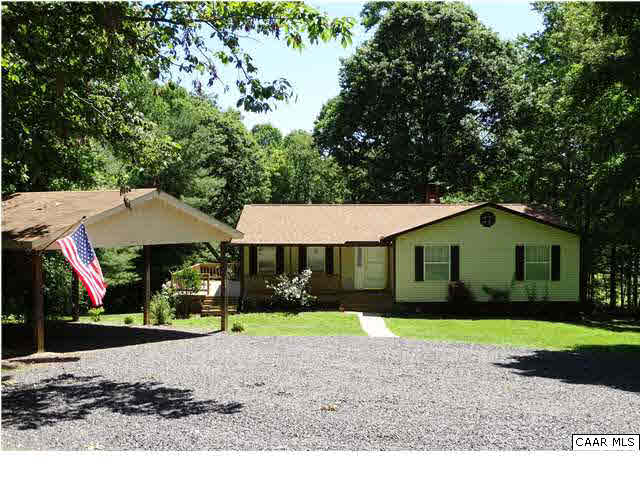 14121 Reva Road Boston, VA 22713 - Photo 1 of 16 a house that has a tree in front of it