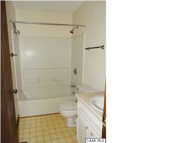 14121 Reva Road Boston, VA 22713 - Photo 12 of 16 a bathroom with a shower and a toilet