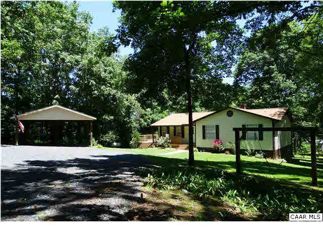 14121 Reva Road Boston, VA 22713 - Photo 16 of 16 a front view of a house with a garden