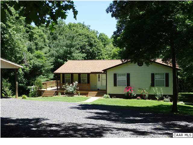 14121 Reva Road Boston, VA 22713 - Photo 2 of 16 a view of a house with a yard and sitting area