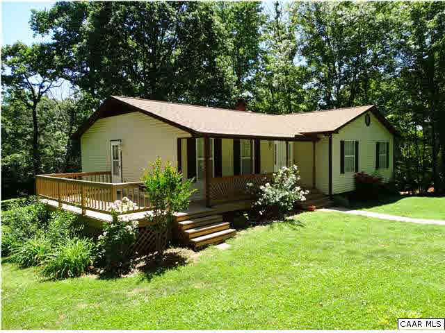 14121 Reva Road Boston, VA 22713 - Photo 3 of 16 a view of a house with yard and a garden