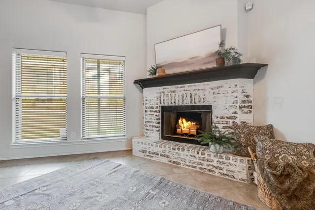 a living room with a fireplace in it