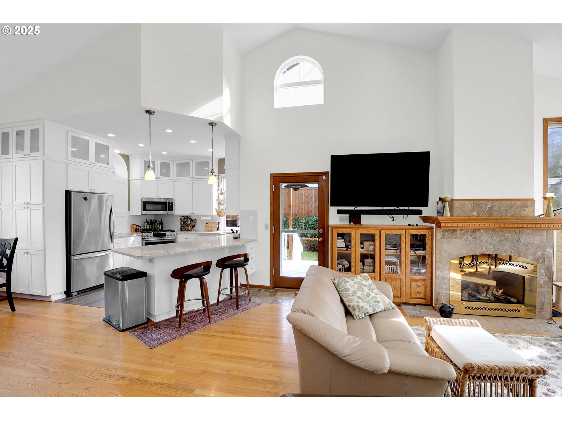 2708 Moon Mountain Drive Eugene, OR 97403 - Photo 11 of 43 a living room with furniture and a flat screen tv