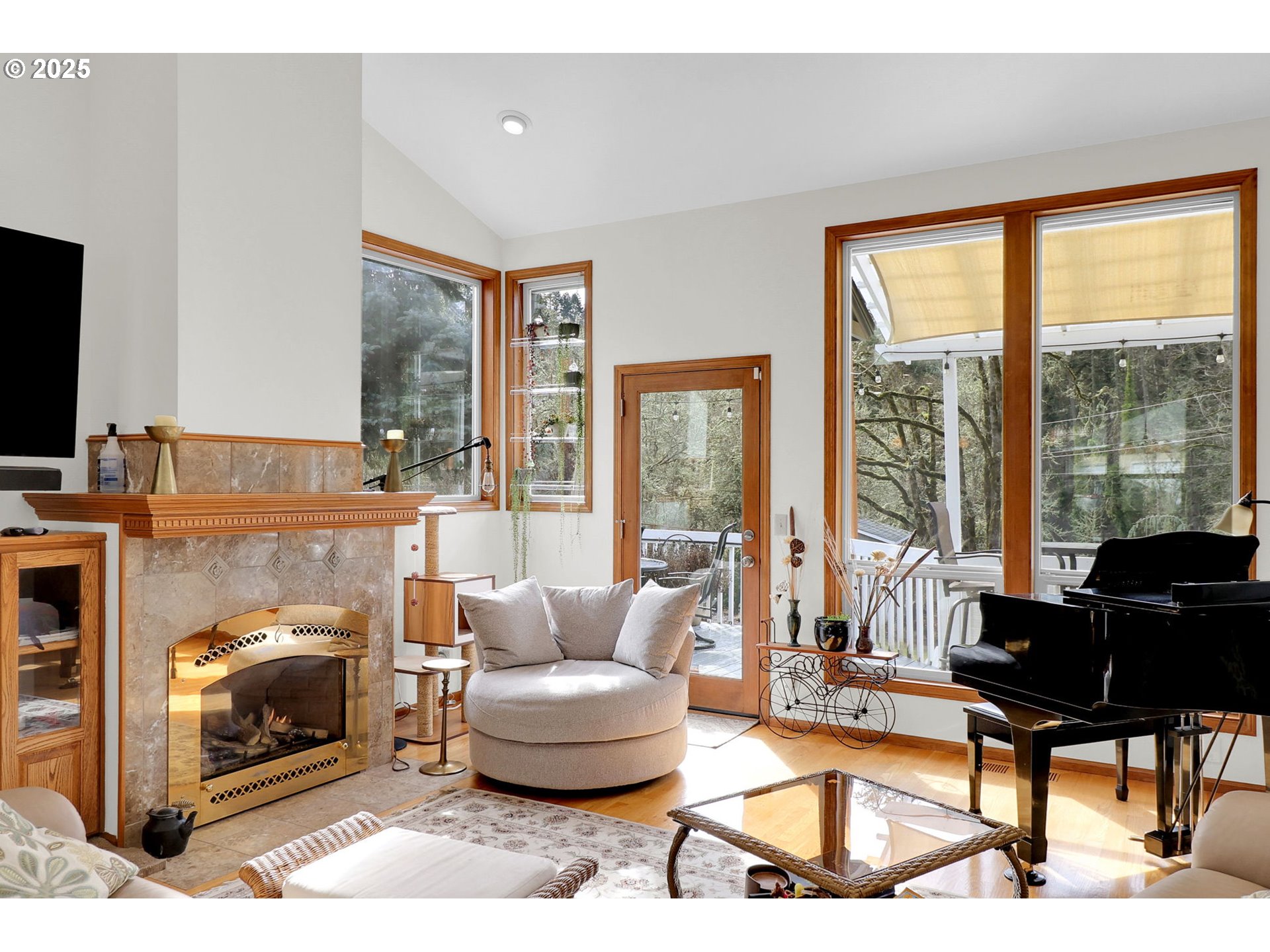 2708 Moon Mountain Drive Eugene, OR 97403 - Photo 13 of 43 a living room with furniture and a fireplace
