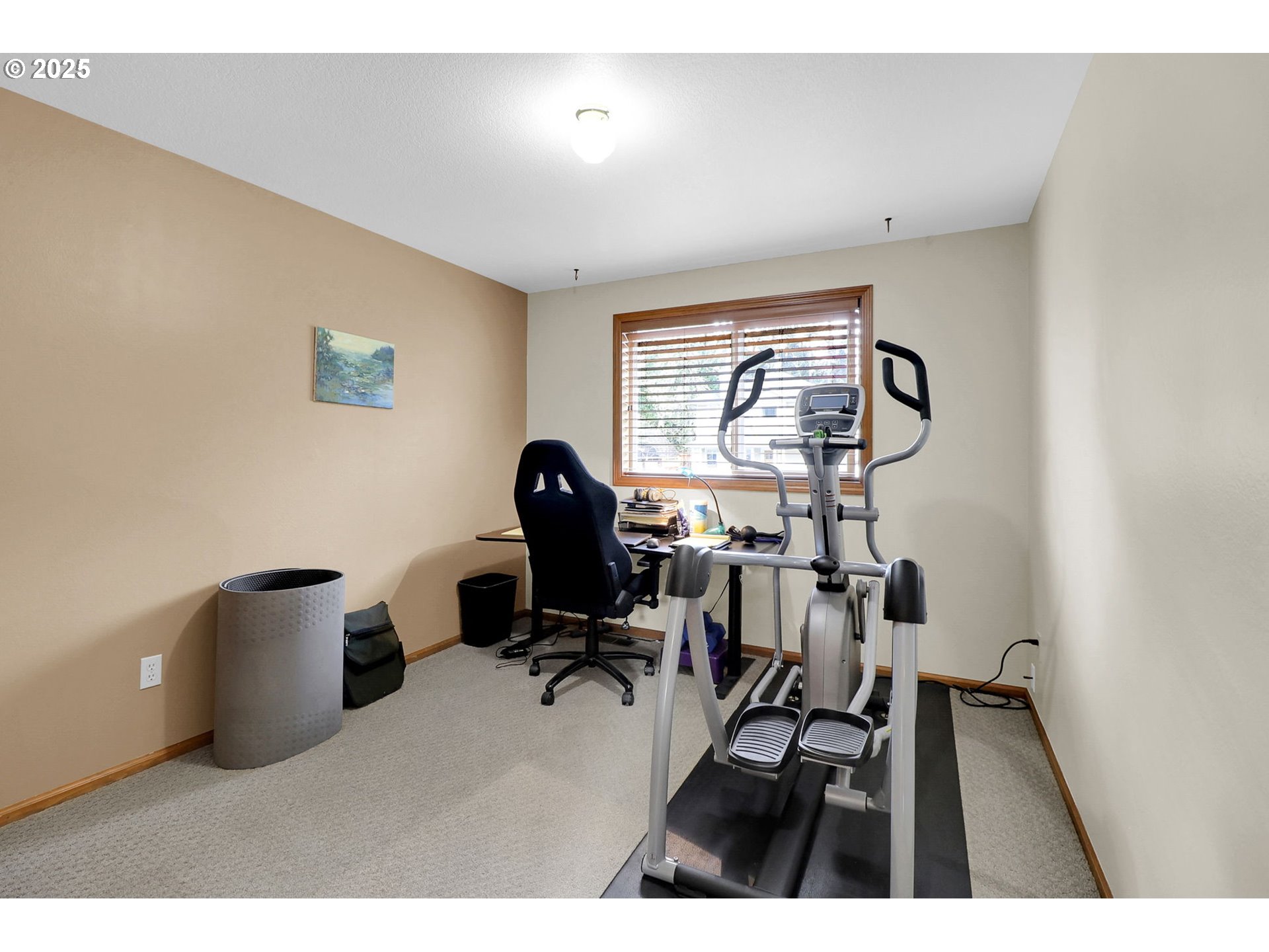 2708 Moon Mountain Drive Eugene, OR 97403 - Photo 27 of 43 a view of a workspace with furniture and a window