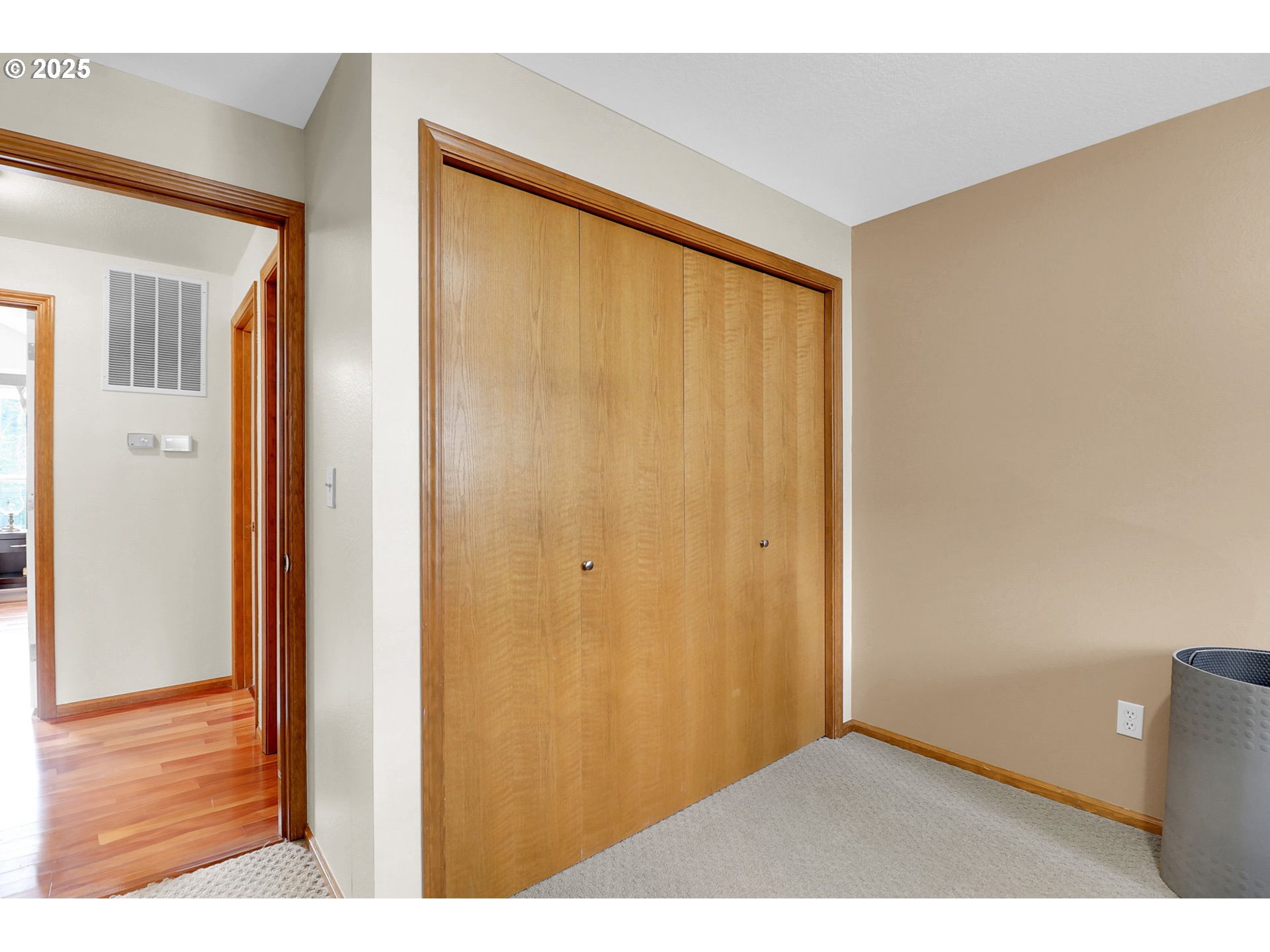 2708 Moon Mountain Drive Eugene, OR 97403 - Photo 28 of 43 a view of an empty room with wooden floor