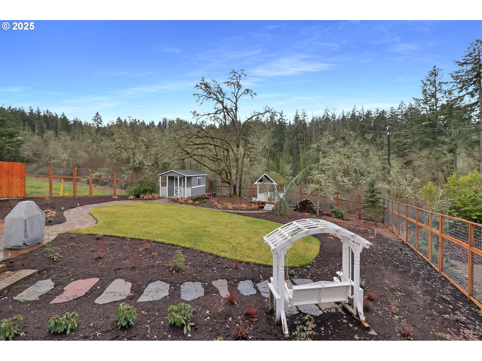 2708 Moon Mountain Drive Eugene, OR 97403 - Photo 36 of 43 a green field with trees in the background
