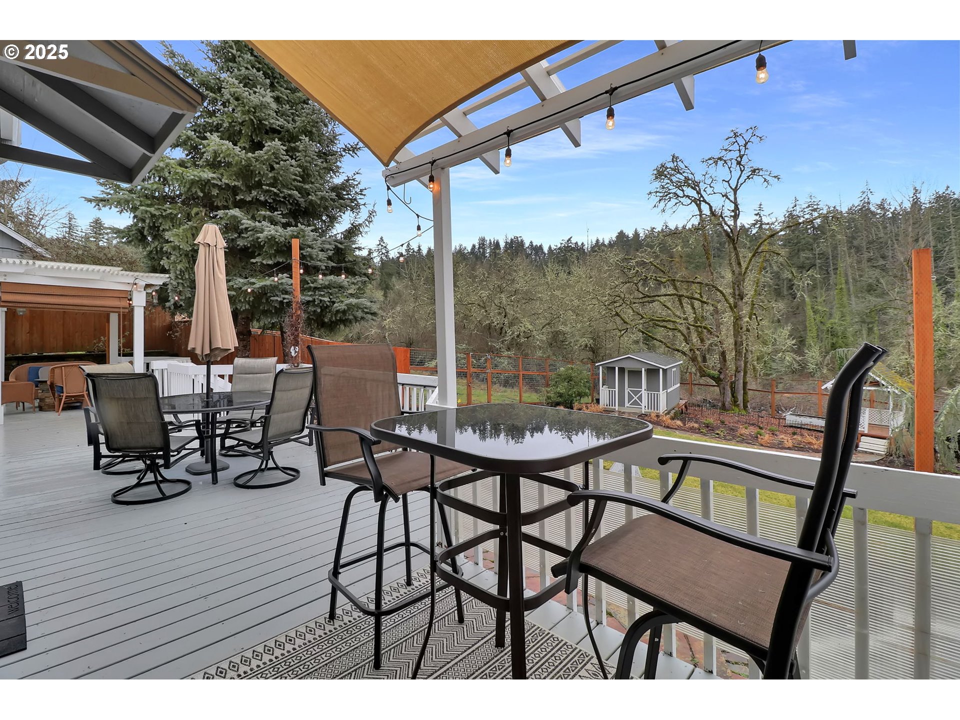 2708 Moon Mountain Drive Eugene, OR 97403 - Photo 37 of 43 a view of a chairs and table in patio with a lake view