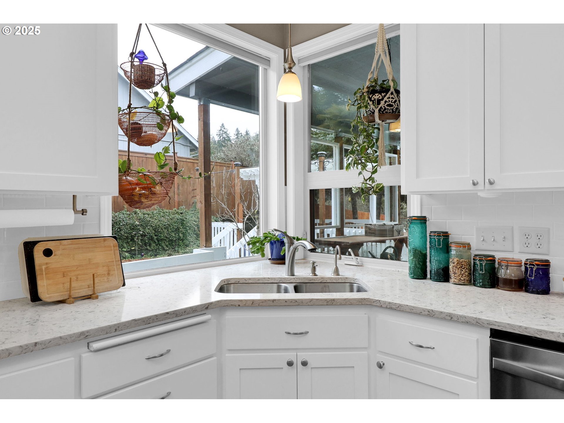 2708 Moon Mountain Drive Eugene, OR 97403 - Photo 7 of 43 a bathroom with a sink a mirror and a window