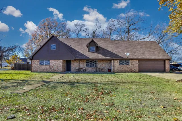 a house view with a garden space