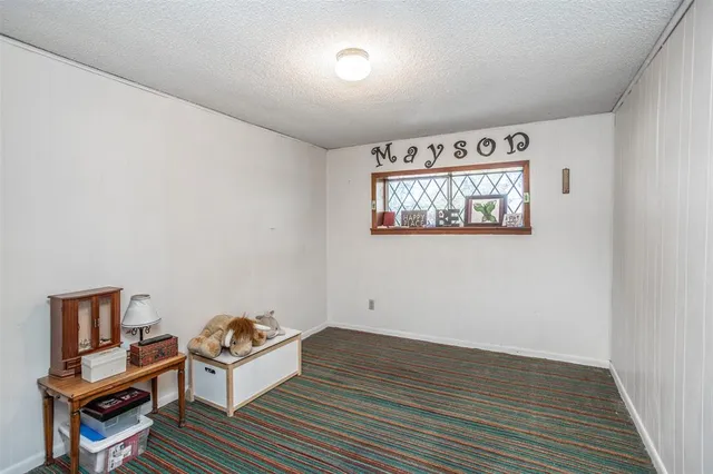 a room with furniture and a window