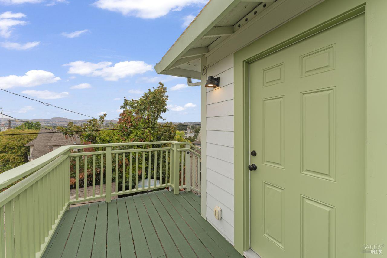 940 York Street Vallejo, CA 94590 - Photo 19 of 30 a view of balcony with wooden floor and fence