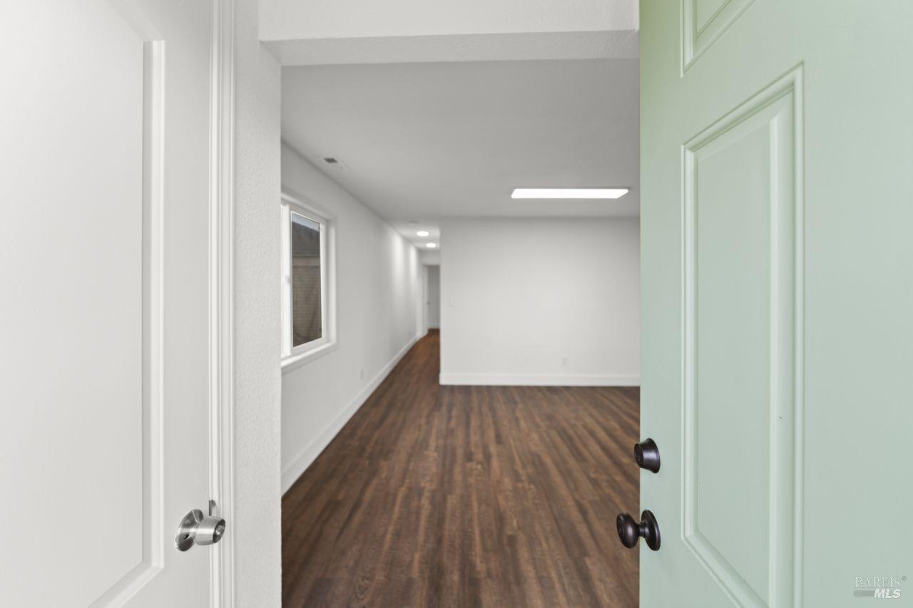 940 York Street Vallejo, CA 94590 - Photo 20 of 30 a view of a hallway with wooden floor
