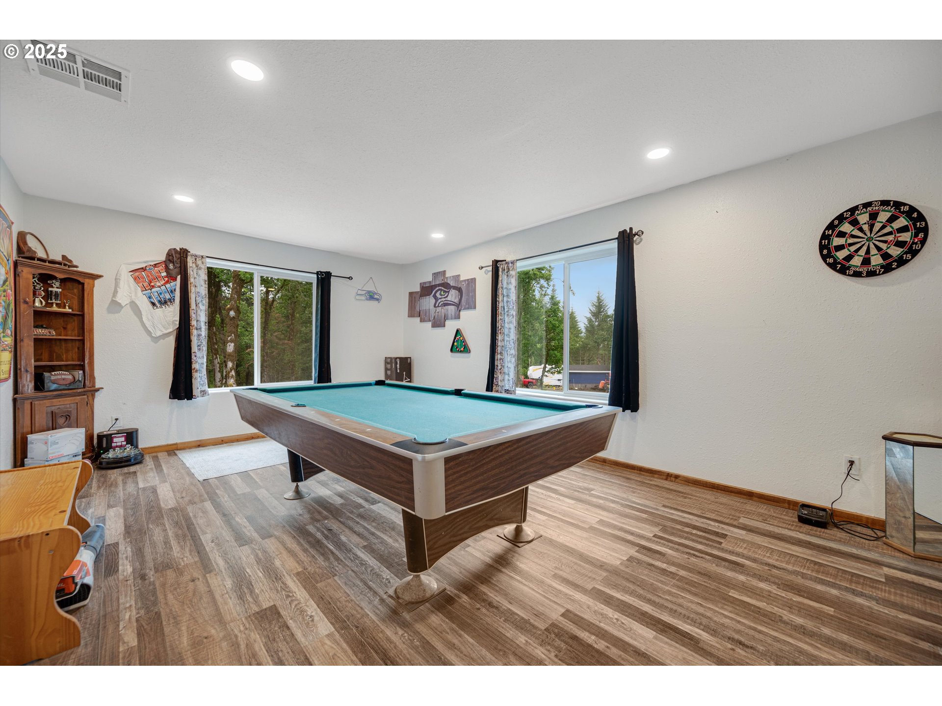 17205 Oakdale Road Dallas, OR 97338 - Photo 11 of 36 a living room with hard wood floors and a table