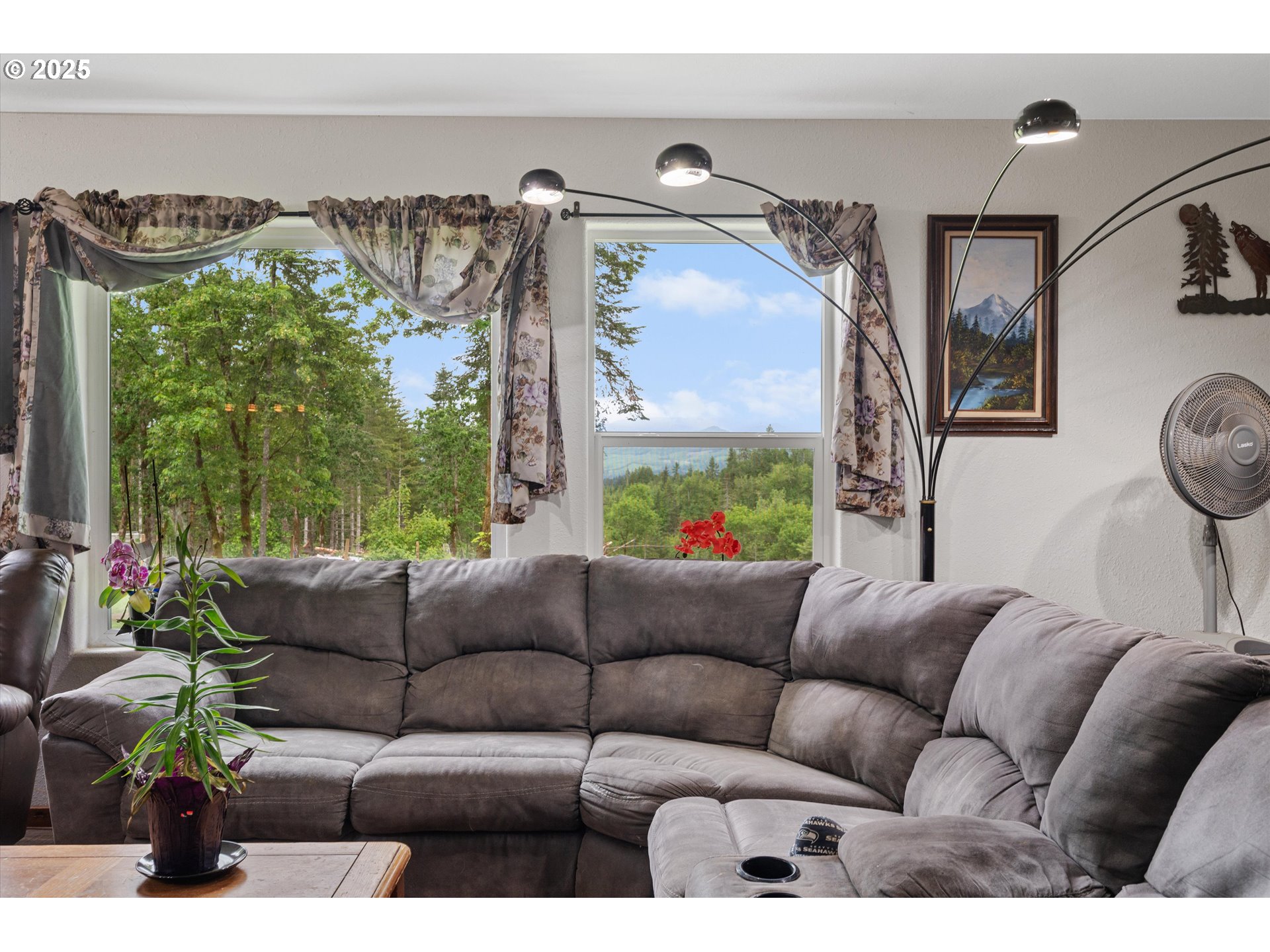 17205 Oakdale Road Dallas, OR 97338 - Photo 15 of 36 a living room with furniture and a large window