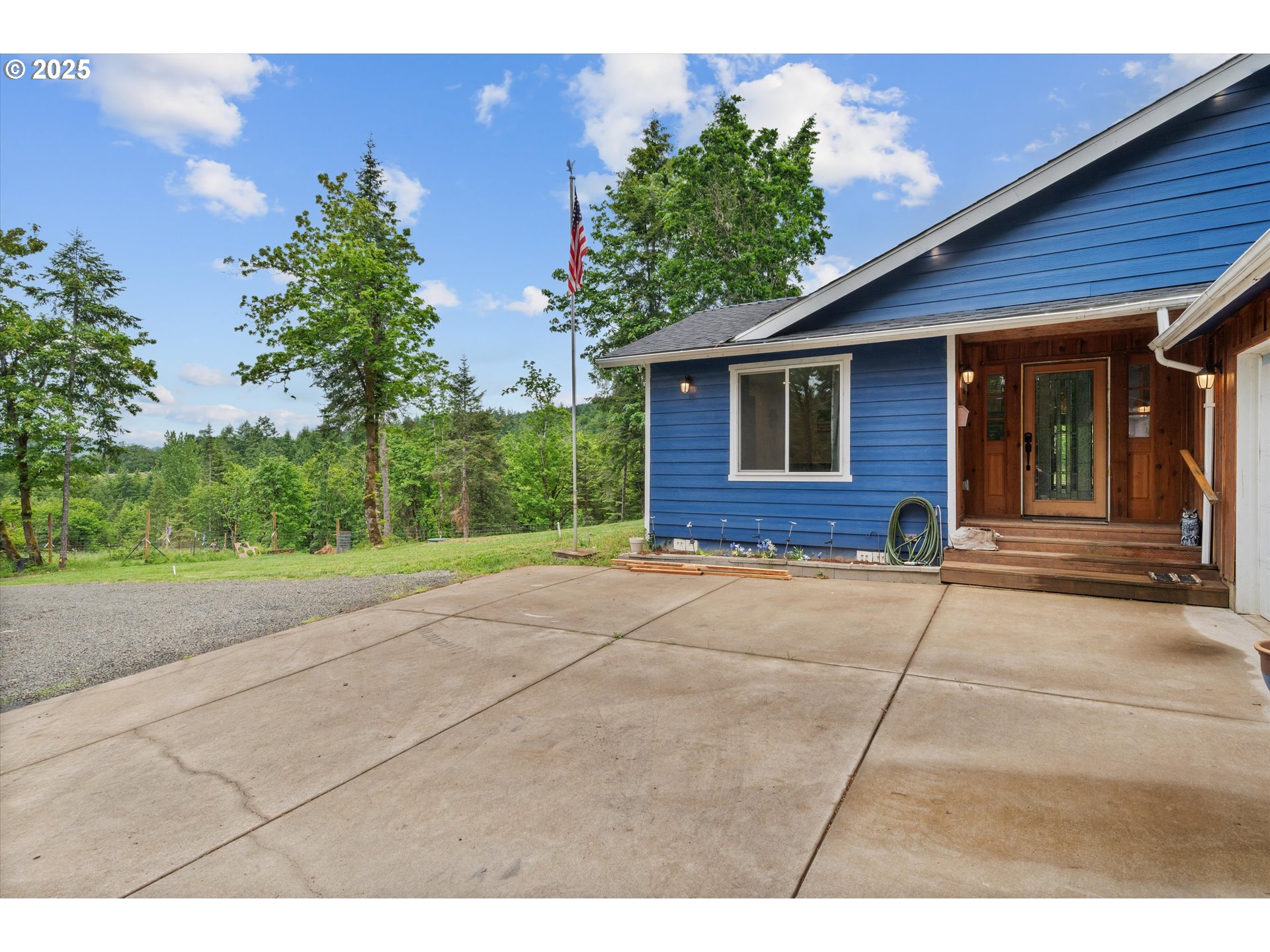 17205 Oakdale Road Dallas, OR 97338 - Photo 7 of 36 a view of a house with a yard and potted plants