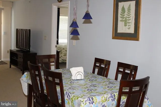 a view of a dining room with furniture
