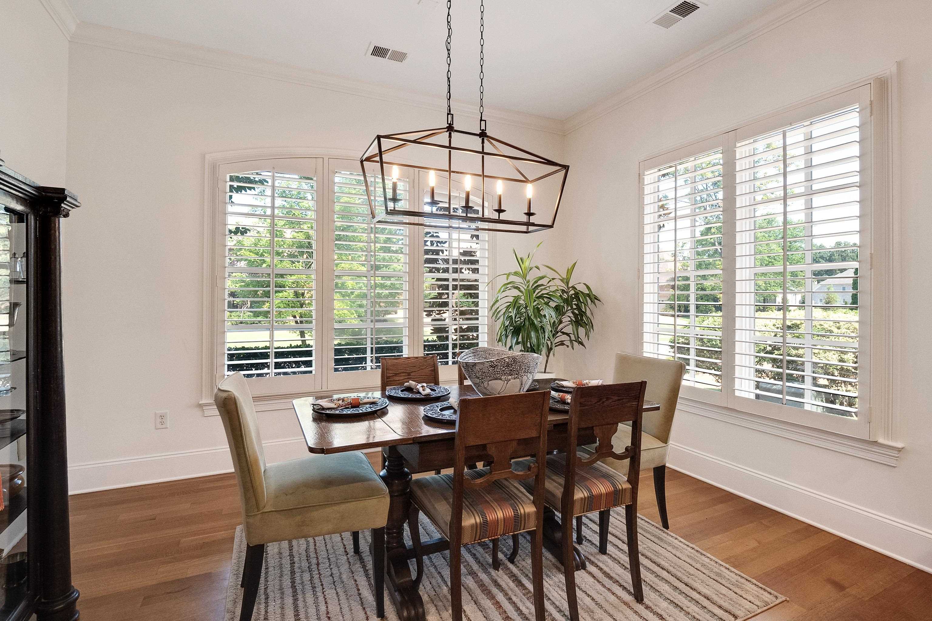 3174 Wetherby Drive Germantown, TN 38139 - Photo 15 of 40 a view of a dining room with furniture window and wooden floor