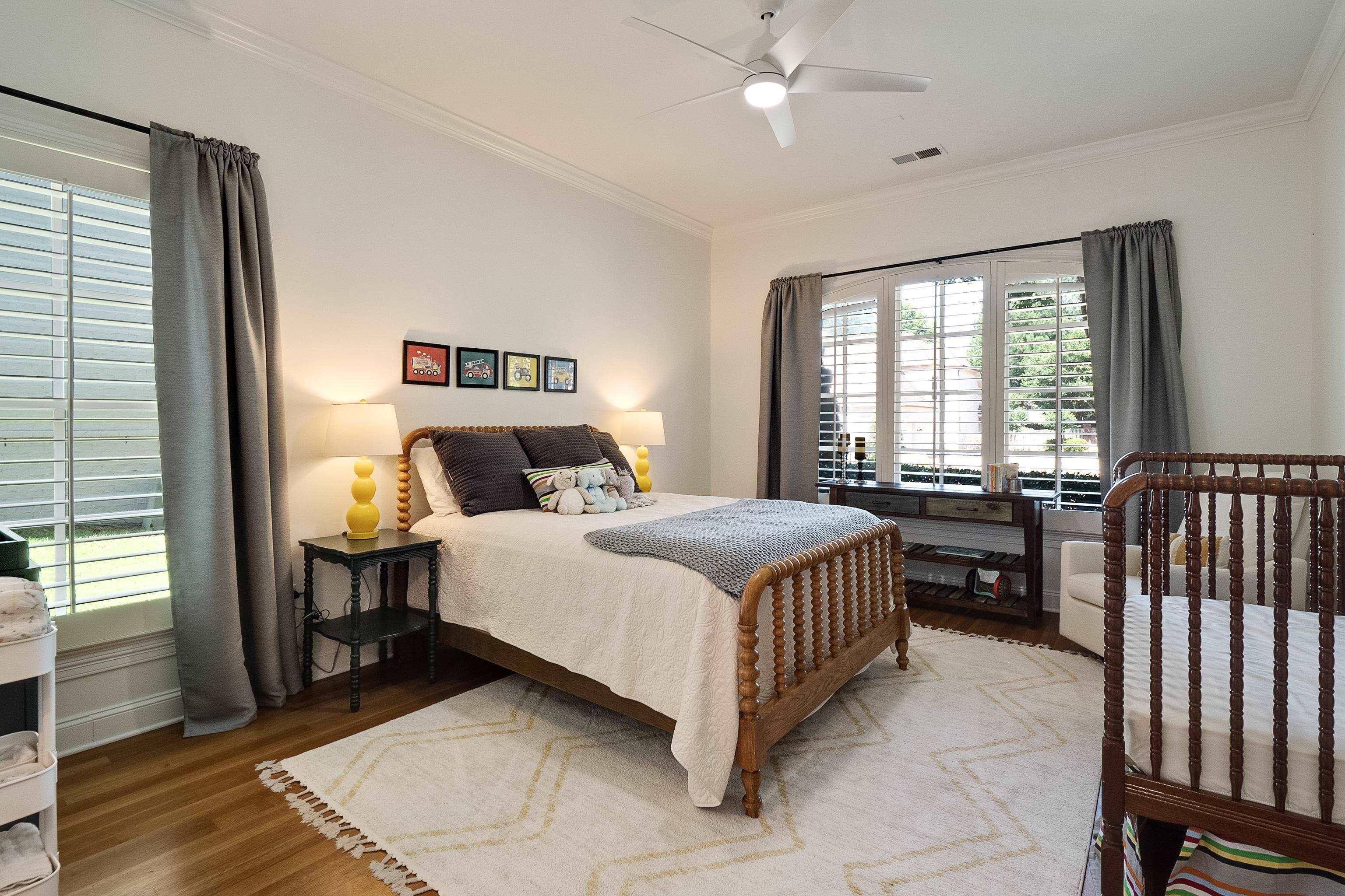 3174 Wetherby Drive Germantown, TN 38139 - Photo 23 of 40 a bedroom with a bed and a window