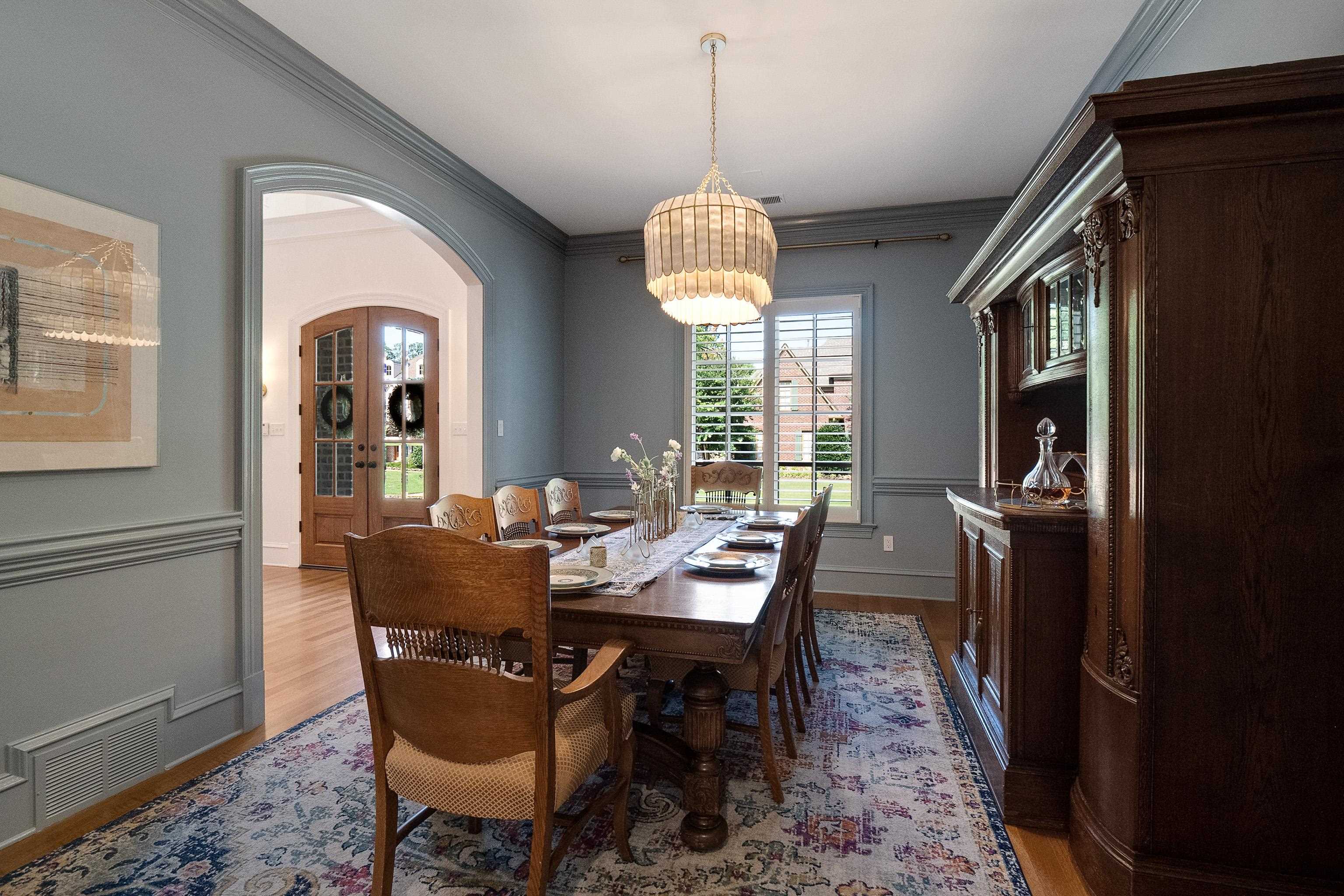 3174 Wetherby Drive Germantown, TN 38139 - Photo 7 of 40 a view of a dining room with furniture window and wooden floor