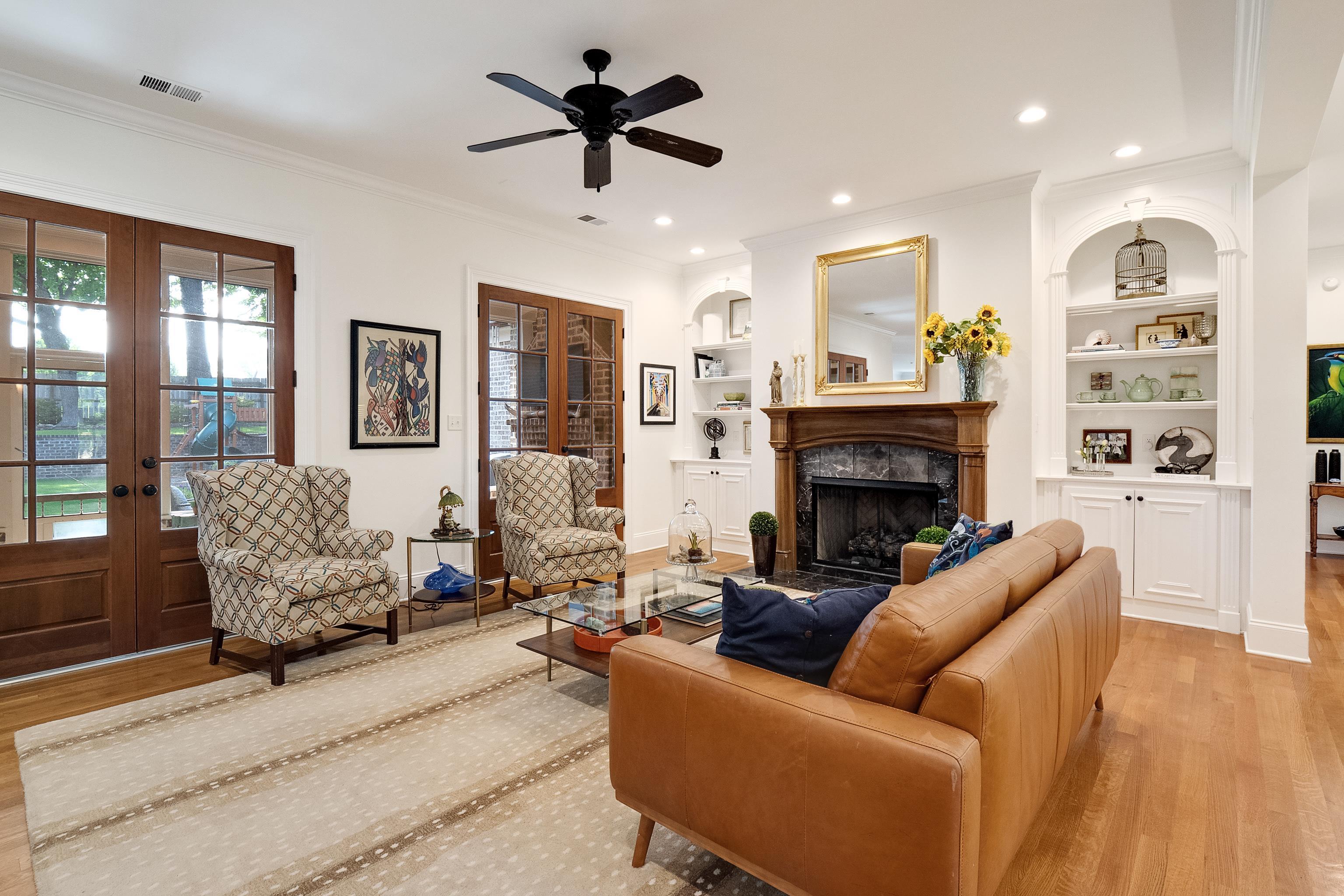3174 Wetherby Drive Germantown, TN 38139 - Photo 8 of 40 a living room with furniture fireplace and a window