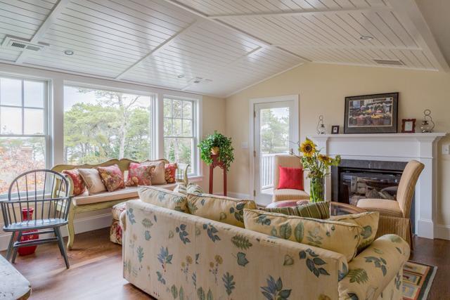 44 Shell Drive North Chatham, MA 02650 - Photo 17 of 34 a living room with furniture and a fireplace
