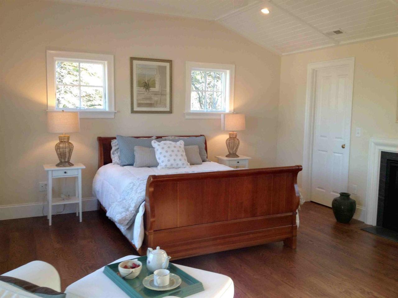 44 Shell Drive North Chatham, MA 02650 - Photo 19 of 34 a bedroom with a bed and wooden floor