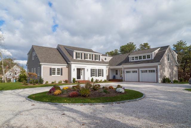 44 Shell Drive North Chatham, MA 02650 - Photo 2 of 34 a front view of a house with a garden
