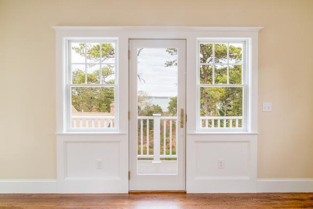 44 Shell Drive North Chatham, MA 02650 - Photo 21 of 34 a view of an empty room with wooden floor and a window