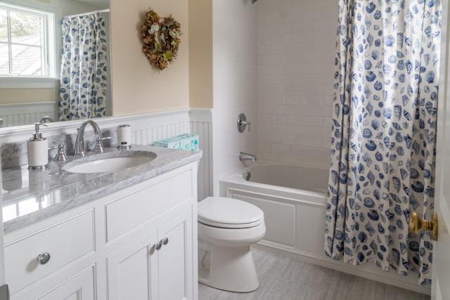 44 Shell Drive North Chatham, MA 02650 - Photo 25 of 34 a bathroom with a granite countertop sink toilet and shower