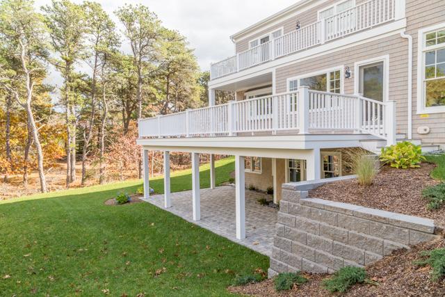 44 Shell Drive North Chatham, MA 02650 - Photo 29 of 34 a view of a house with backyard and a garden