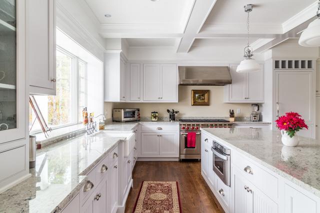 44 Shell Drive North Chatham, MA 02650 - Photo 6 of 34 a kitchen with a sink stove top oven and cabinets