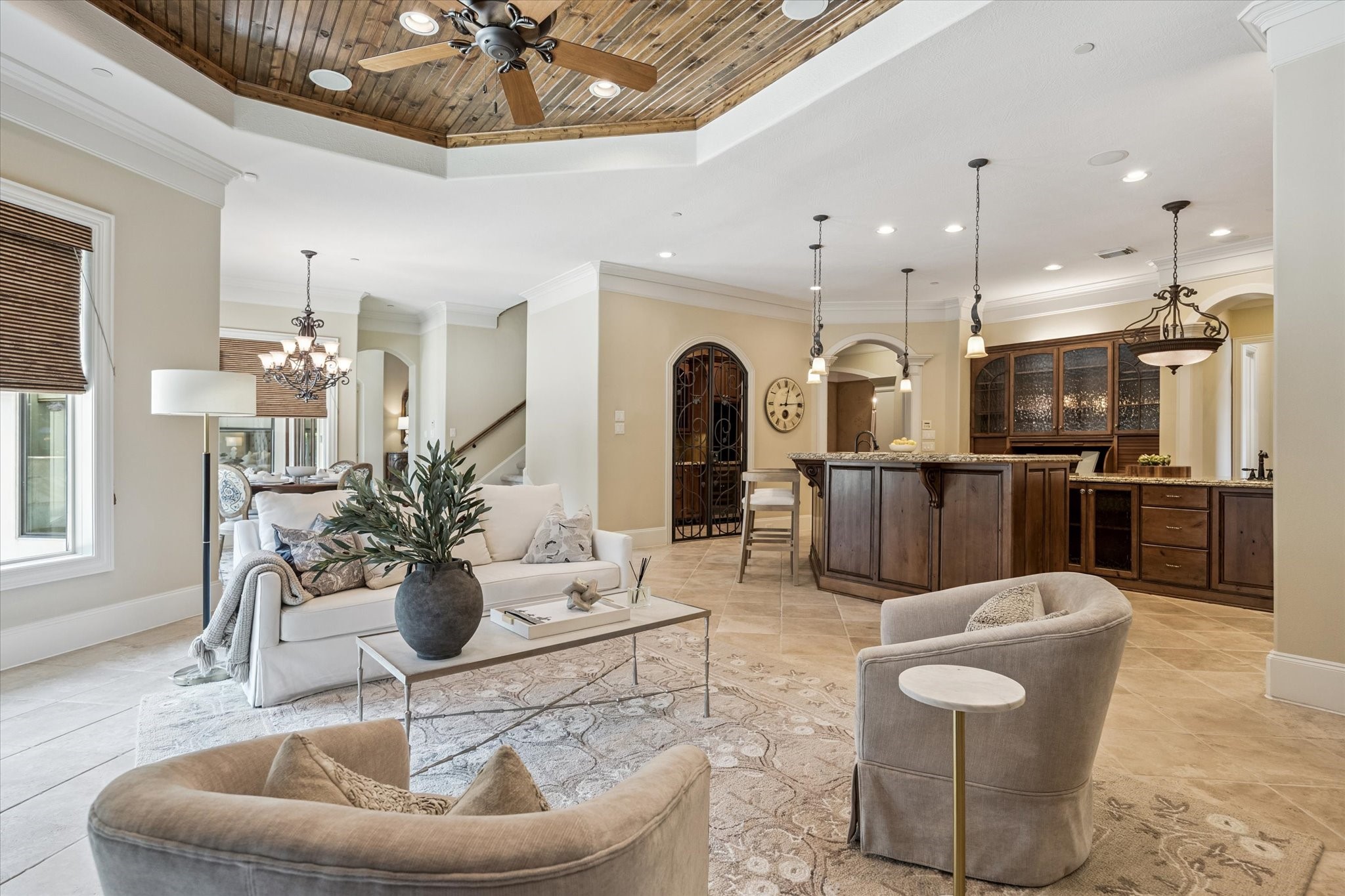 570 Lanecrest Lane Houston, TX 77024 - Photo 18 of 36 a living room with furniture kitchen and a chandelier
