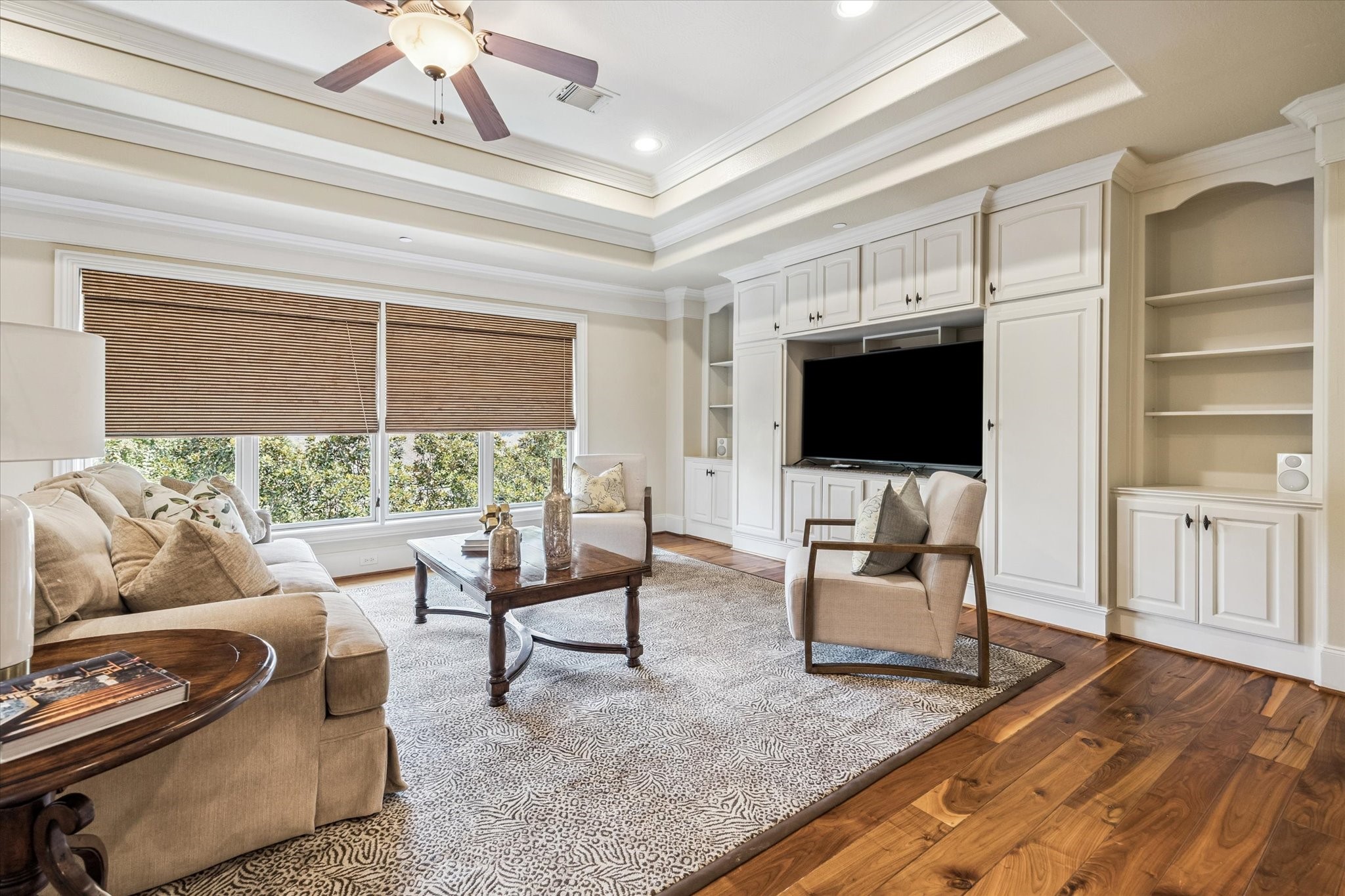570 Lanecrest Lane Houston, TX 77024 - Photo 26 of 36 a living room with furniture and a flat screen tv