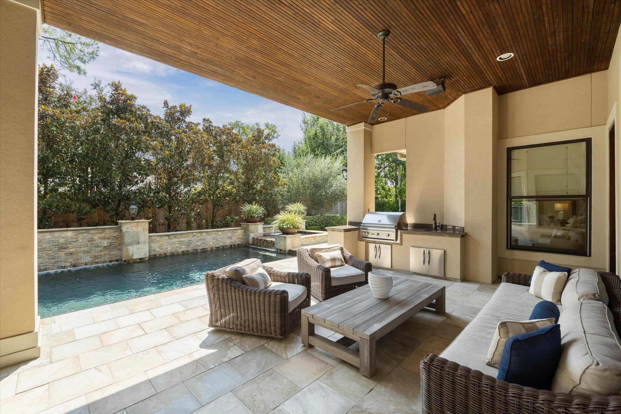 570 Lanecrest Lane Houston, TX 77024 - Photo 6 of 36 a outdoor living space with furniture and a potted plant