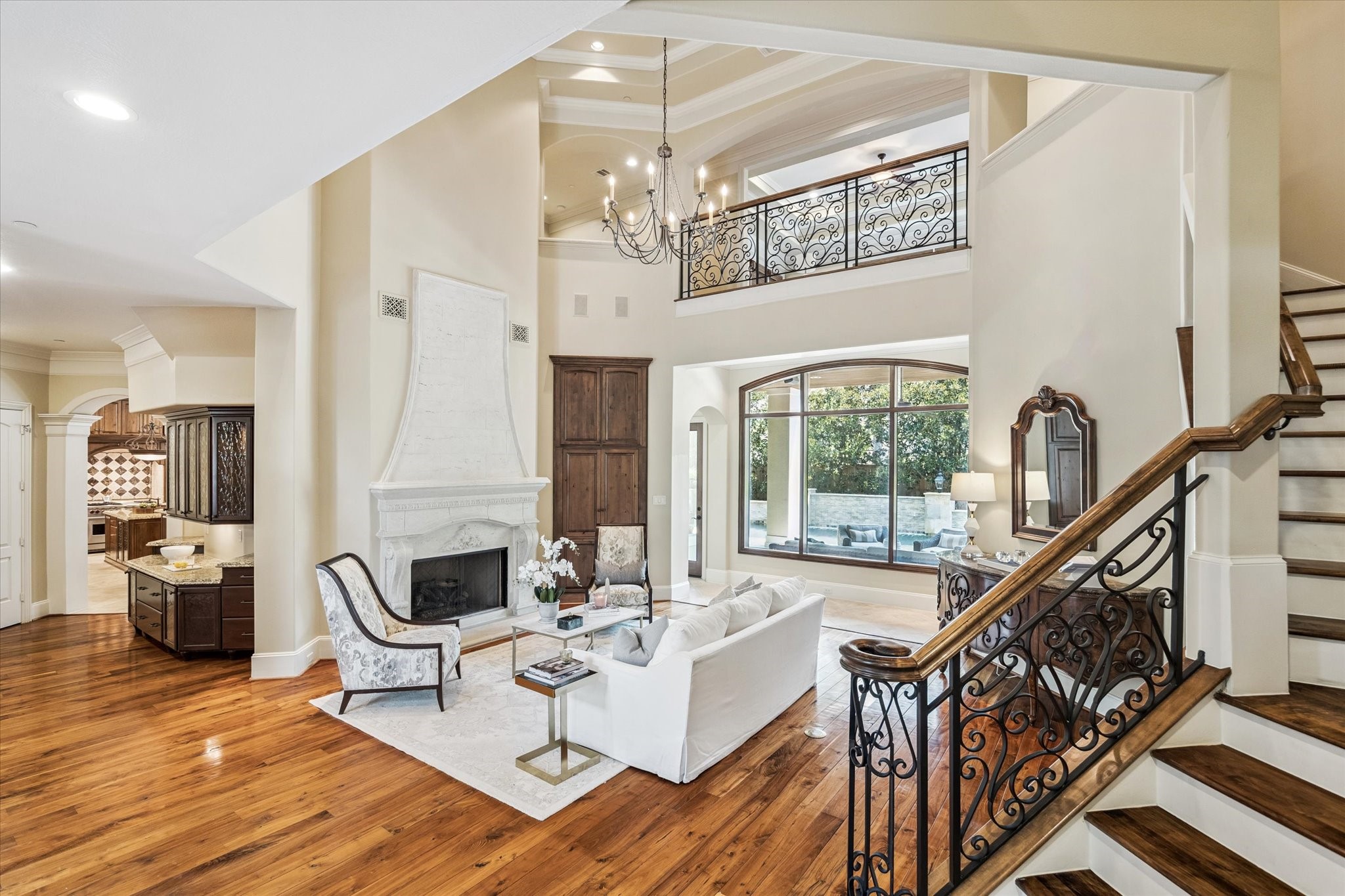 570 Lanecrest Lane Houston, TX 77024 - Photo 8 of 36 a living room with furniture a chandelier and a dining table