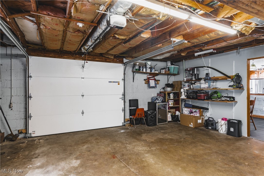 111 River Hill Road Washington, WV 26181 - Photo 24 of 29 The 2 car garage is attached to the home and there are two access doors to enter the home along with a door to go outside without opening the garage door if desired. Garage door opener and home has 200 amp service.