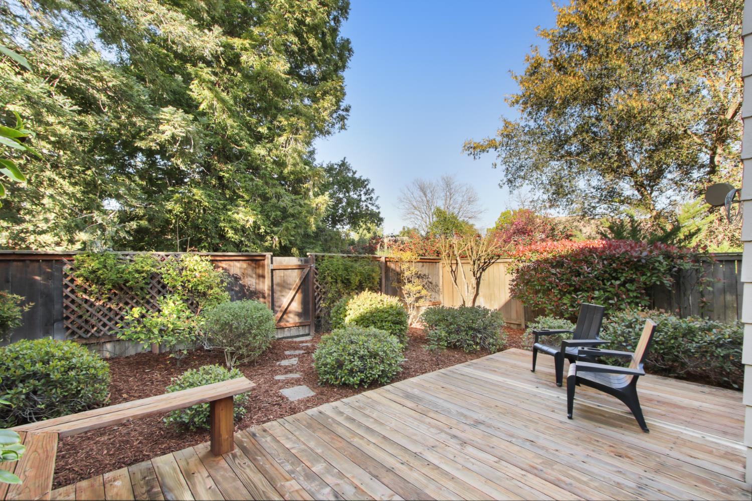 2033 Manet Place Davis, CA 95618 - Photo 34 of 56 wooden deck featuring a fenced backyard and a gate to the greenbelt