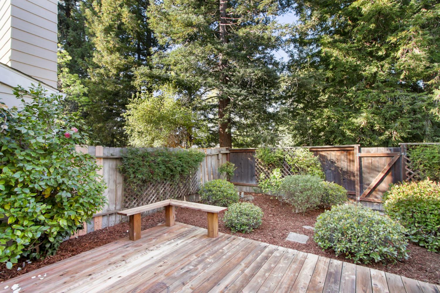 2033 Manet Place Davis, CA 95618 - Photo 35 of 56 wooden terrace with a fenced backyard