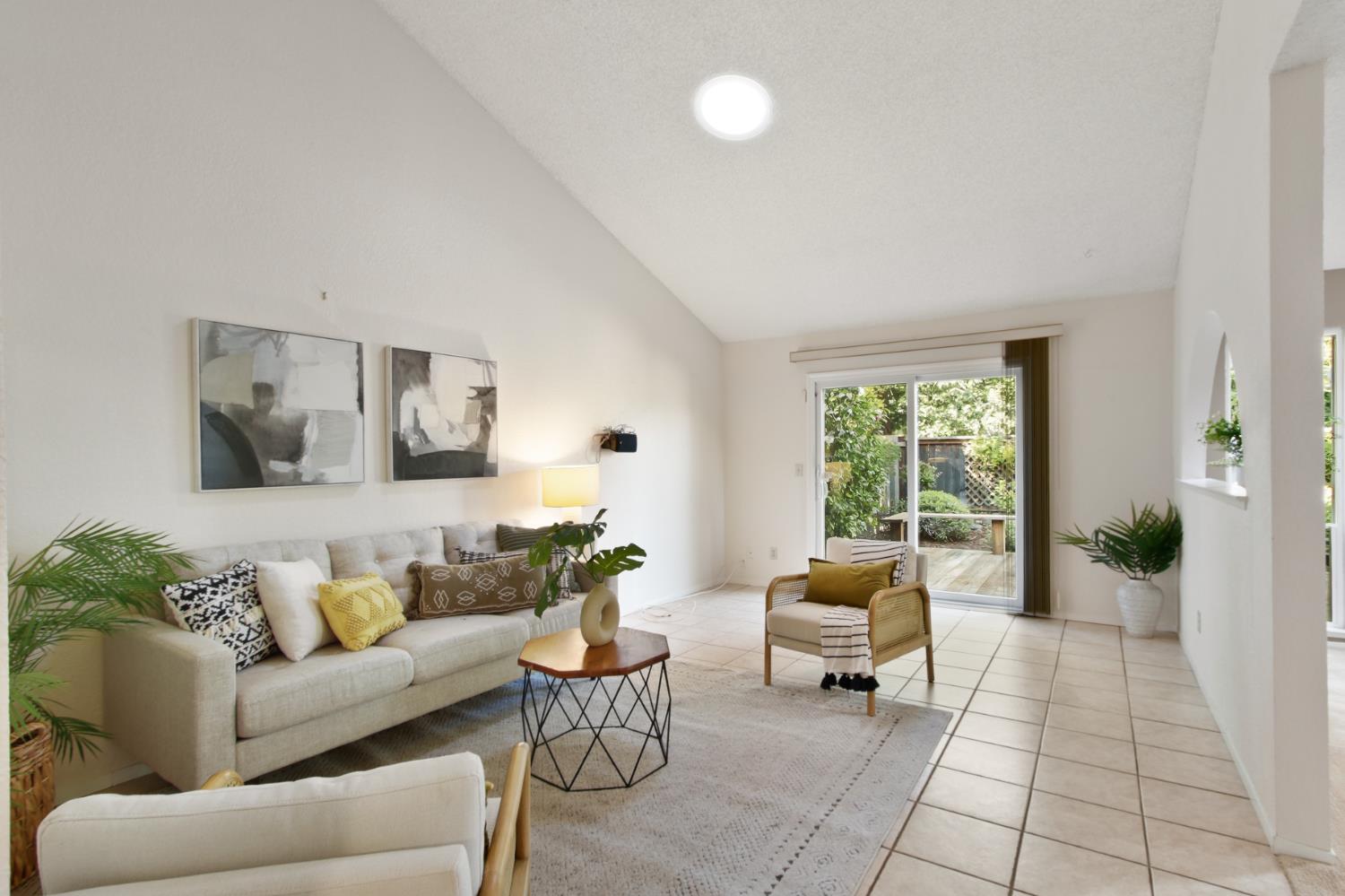 2033 Manet Place Davis, CA 95618 - Photo 10 of 56 family room with vaulted ceiling