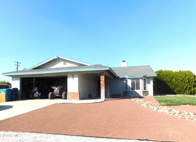 a view of a house with a roof deck