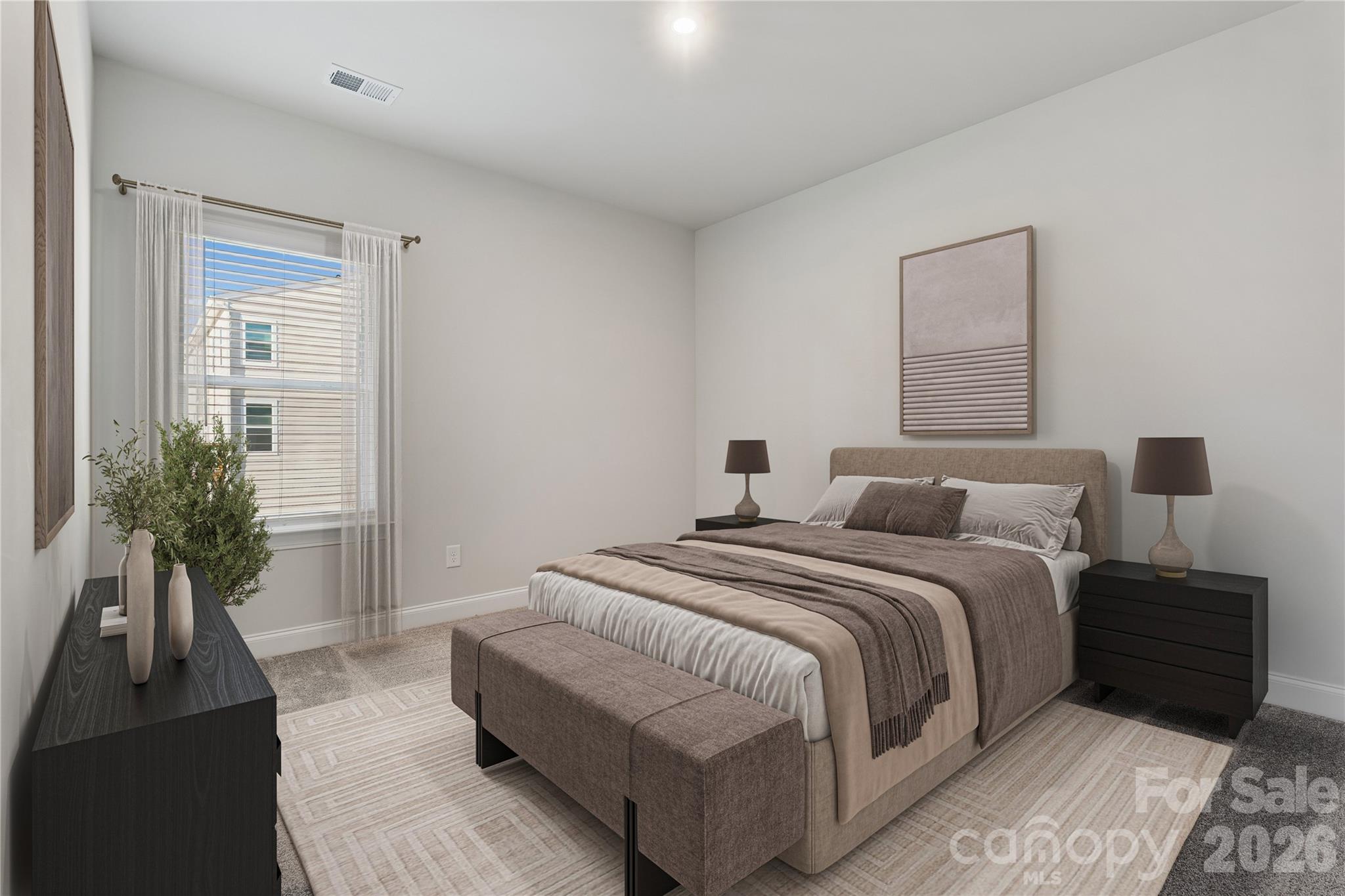 1827 Viewfield Road Fort Mill, SC 29708 - Photo 16 of 43 a bedroom with a bed and a potted plant