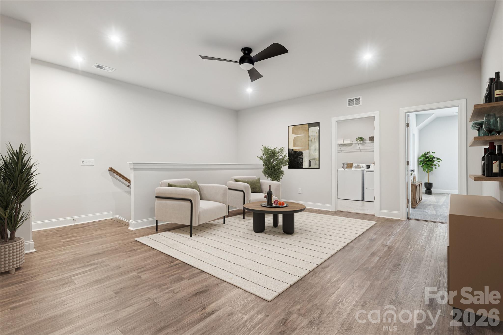 1827 Viewfield Road Fort Mill, SC 29708 - Photo 18 of 43 a living room with furniture and a wooden floor