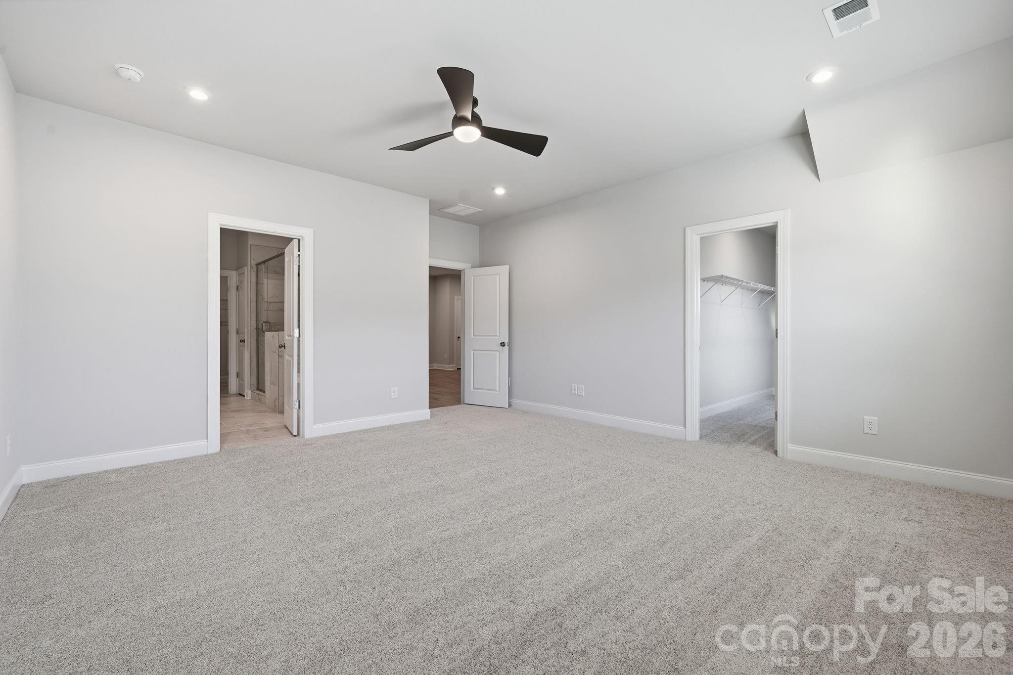 1827 Viewfield Road Fort Mill, SC 29708 - Photo 2 of 43 an empty room with fan and windows