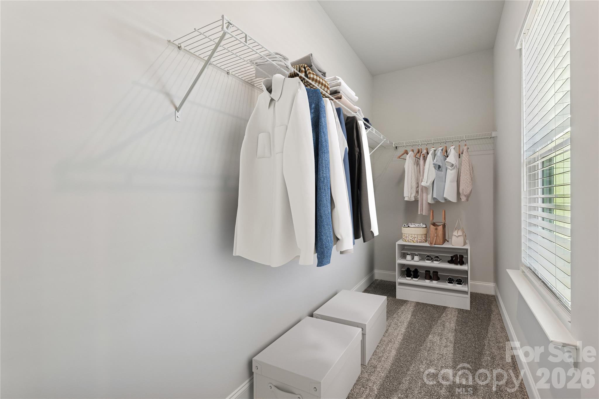 1827 Viewfield Road Fort Mill, SC 29708 - Photo 4 of 43 a view of walk in closet with clothes and shoes