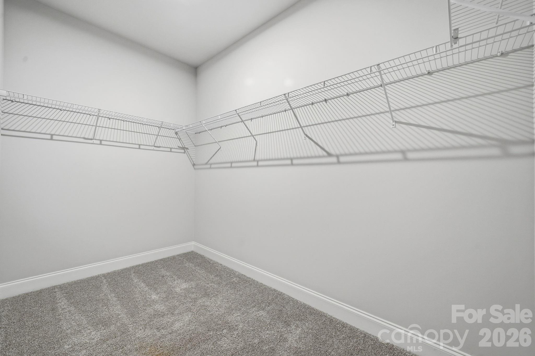 1827 Viewfield Road Fort Mill, SC 29708 - Photo 8 of 43 a view of a room with racks on the wall