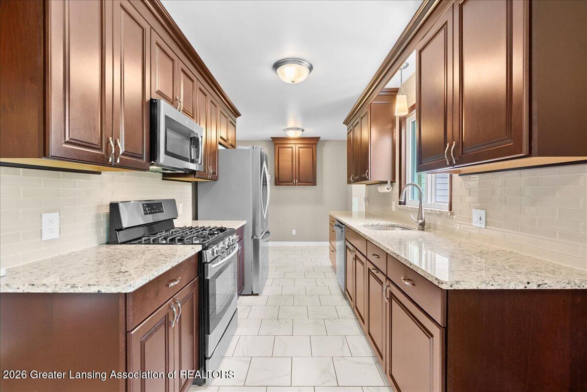 1727 Wellington Road Lansing, MI 48910 - Photo 10 of 46 28-Media Jett - 22