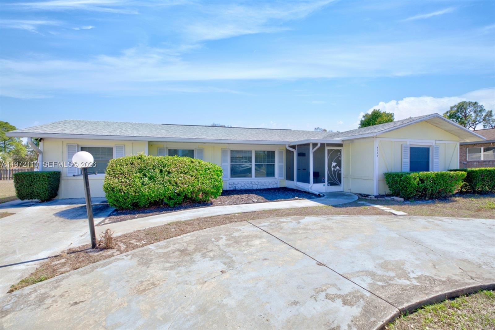 4131 Bianca Street Sebring, FL 33872 - Photo 1 of 30 front view of a house with a yard